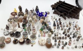 Collection of ceramic and metal thimbles with display shelves, together with a large collection of