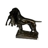 FRITZ DILLER(1875-1945). A Bronze model of a hunting dog and fox.
