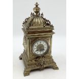 A large C19th French 8 day mantle clock , cast brass case with relief floral decoration, circular