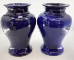 A pair of large blue ceramic baluster floor vases each 50cmh