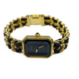 A Chanel ladies gold plated wristwatch.