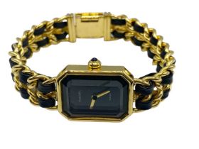 A Chanel ladies gold plated wristwatch.