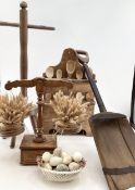 A pine spoon rack, a set of pine scales, wash dolly and a grain shovel