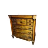 Large flame mahogany (faded) Scottish chest of drawers flanked by turned columns some fading and