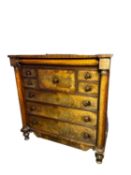 Large flame mahogany (faded) Scottish chest of drawers flanked by turned columns some fading and
