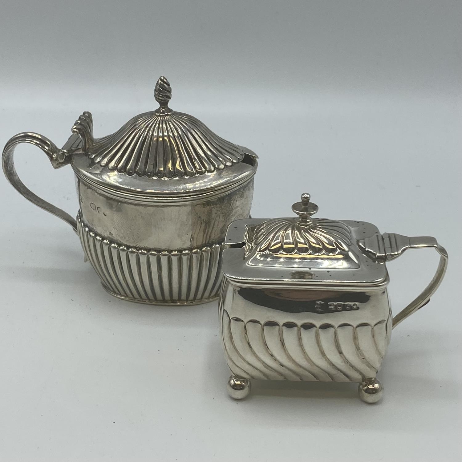 A collection of sterling silver table items to include a pair of Adams Style Pepperets, A pepper - Image 6 of 6
