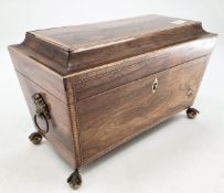 Mahogany string inlaid sarcophagus tea caddy with ball and claw feet and fitted interior