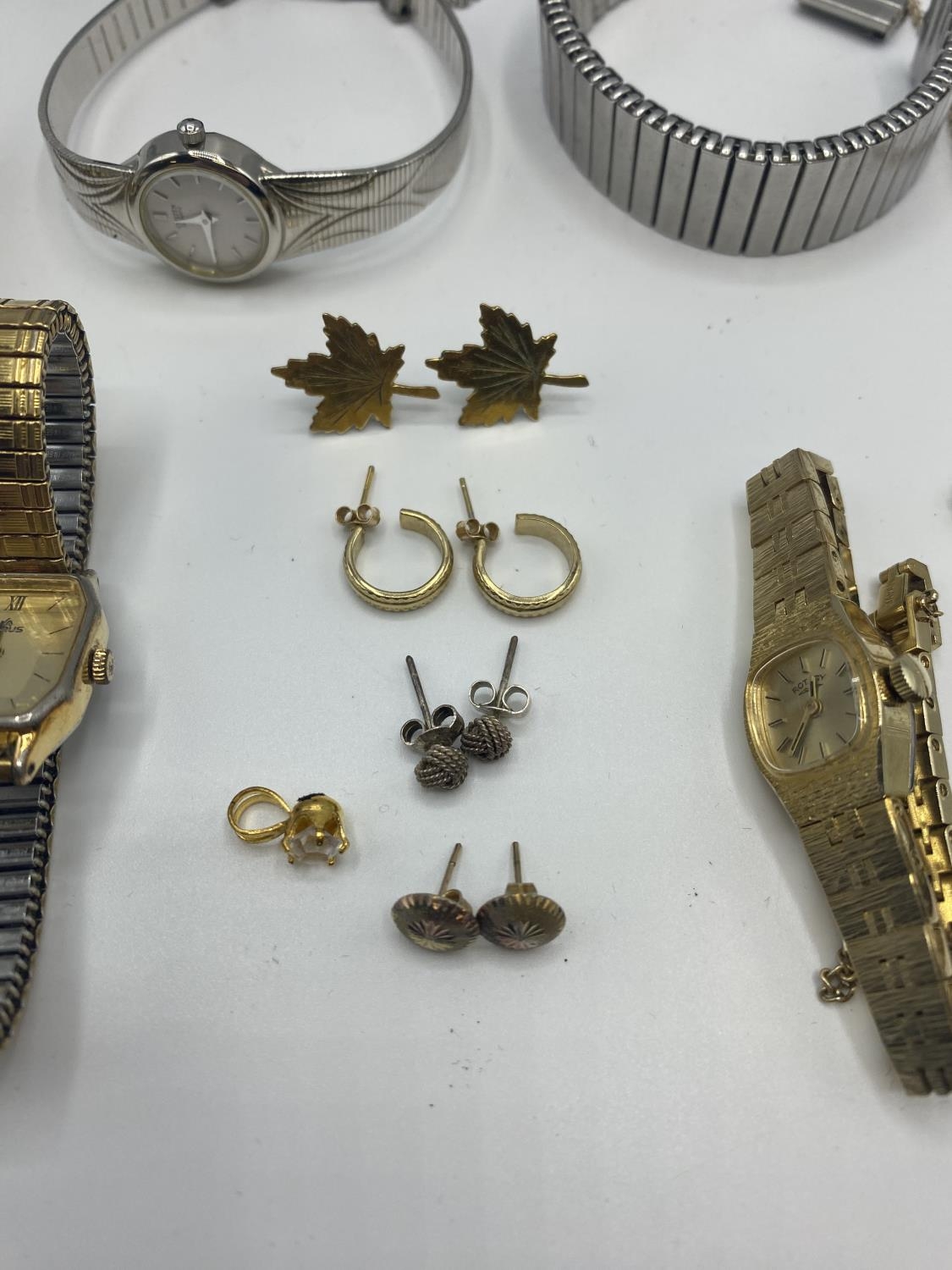 A collection of unmarked yellow metal jewellery together with some high street fashion watches. - Image 2 of 5