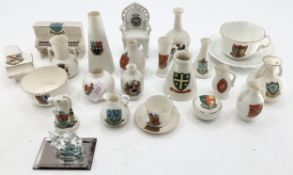 A collection of ceramic crested ware, various makers