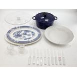 A collection of glass cutlery, salt etc, and meat plates bowls and Nomar casserole dish
