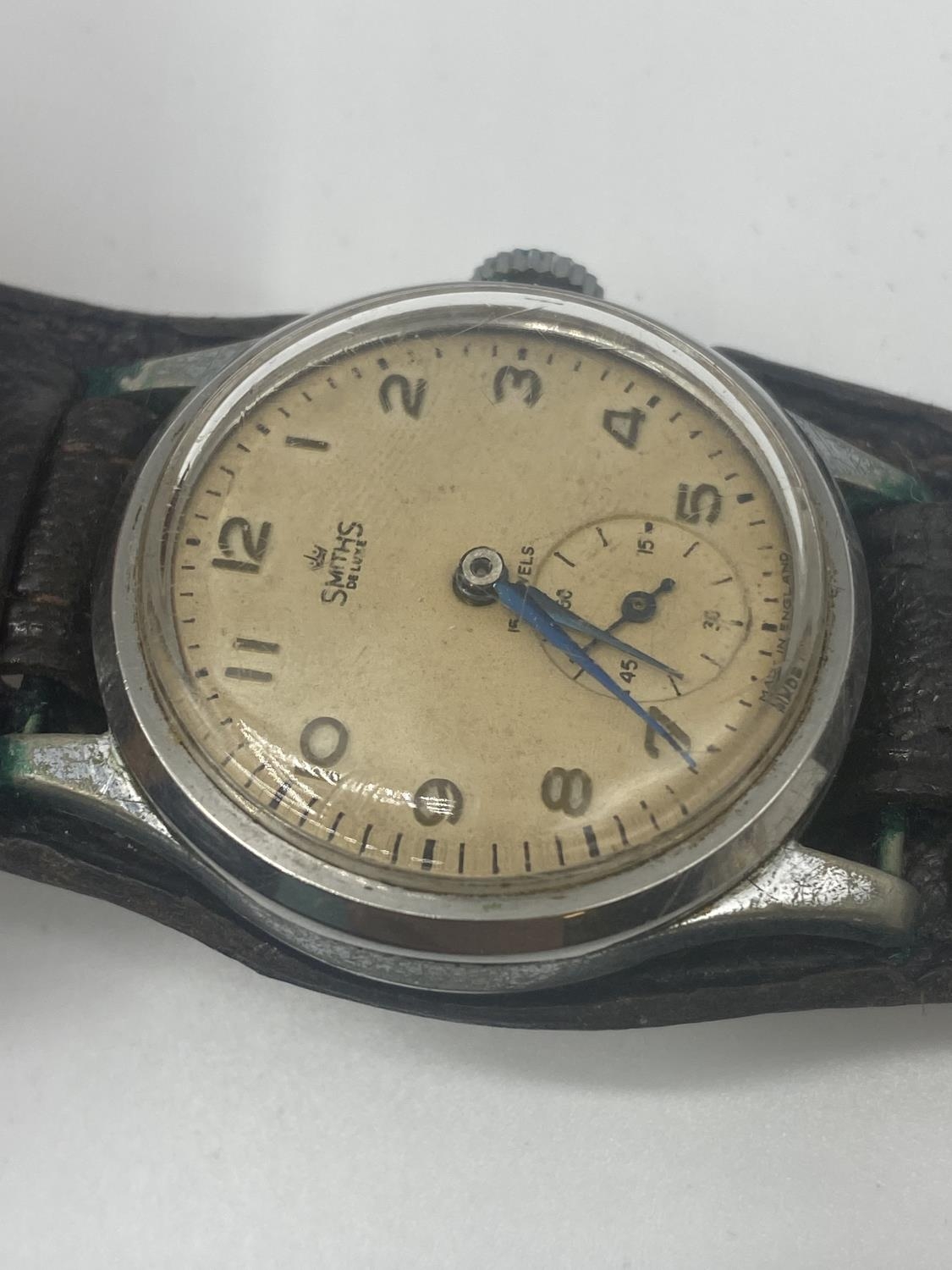 A vintage smith's deluxe 15 Jewel gents wristwatch 34mm case , currently running