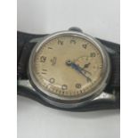 A vintage smith's deluxe 15 Jewel gents wristwatch 34mm case , currently running