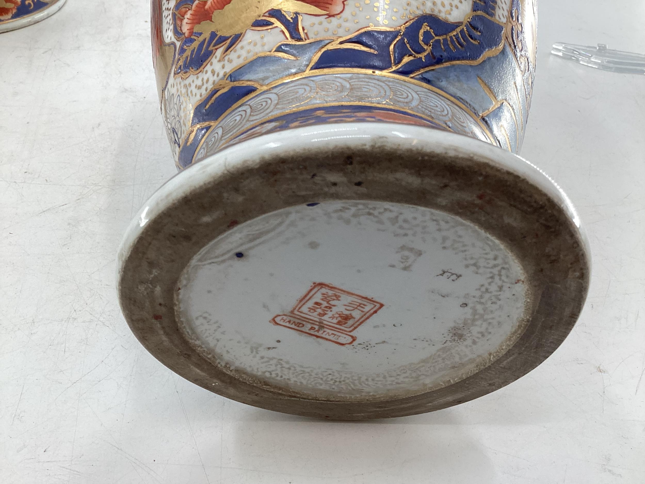 A pair of Japanese vases, decorated in the Imari Palette, red stamp to base, hand painted, 38.5cmH - Image 3 of 5