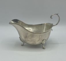 A sterling silver sauce boat. Mappin and Webb. Birmingham. 1911. 176g.