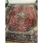 Large Tabriz rug, overall red ground with blue boarders, multi stylized
