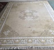 A Large Oriental wash woollen cream/yellow ground rug 275cm x 372cm (ex 157), some minor wear and