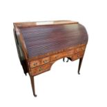 Mahogany tambour front ladies writing desk, with fitted interior and slide out tooled leather