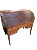Mahogany tambour front ladies writing desk, with fitted interior and slide out tooled leather