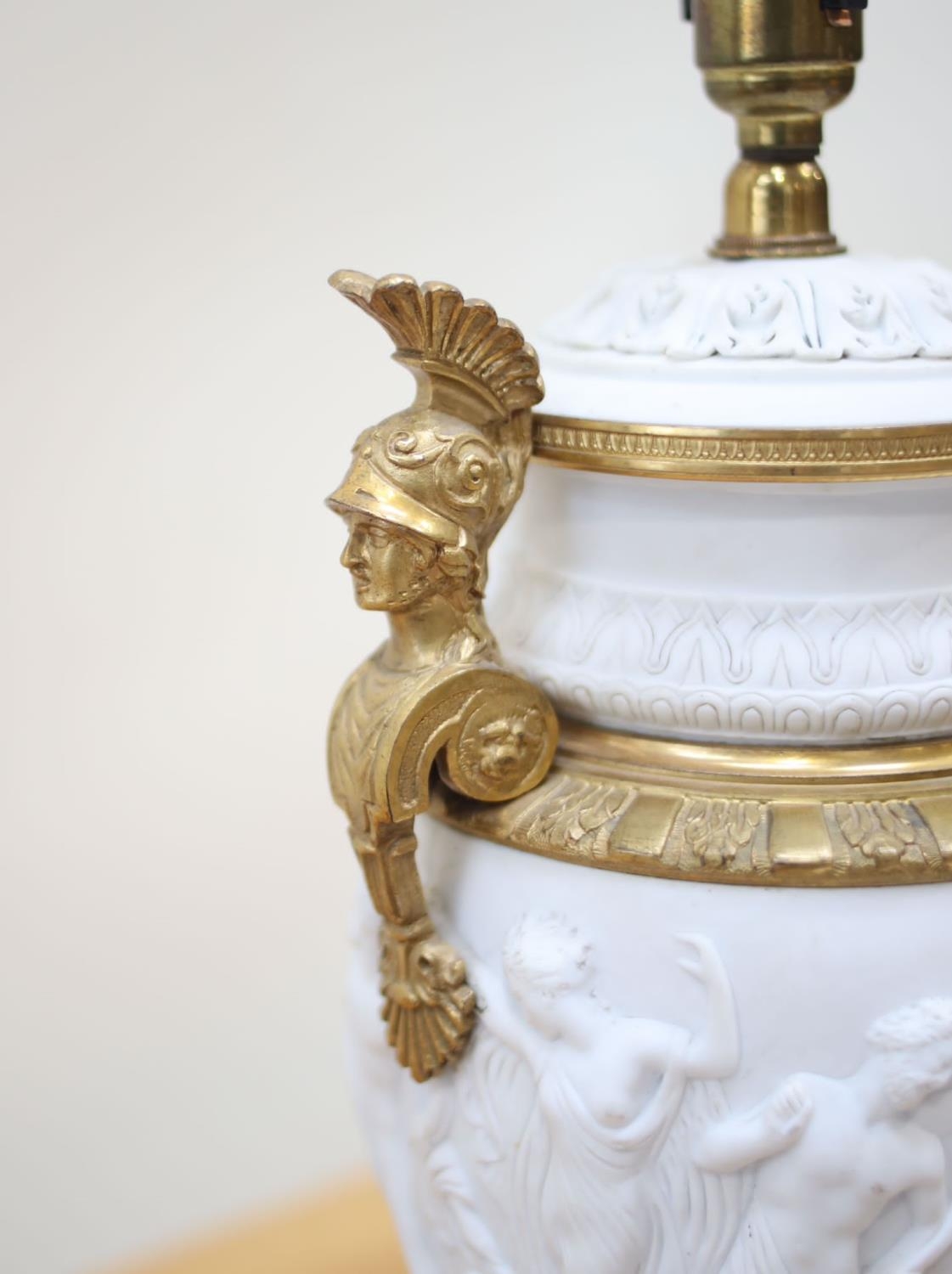 An Empire period biscuit porcelain urn with bas relief and solid brass mounts, as a table lamp, - Image 3 of 3