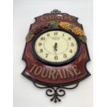 A Chinon Touraine and metal wall clock by Densbury of London 77cm