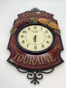 A Chinon Touraine and metal wall clock by Densbury of London 77cm