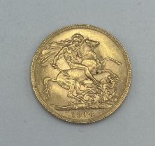 A 1914 gold sovereign/ Perth Mint mark. 8.00g.