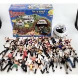 A Thunderbirds Tracy Island play set, boxed together with World Wresting Entertainment figures and