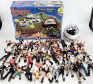 A Thunderbirds Tracy Island play set, boxed together with World Wresting Entertainment figures and