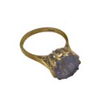 A 9ct gold and amethyst single stone ring, circular round cut Amethyst in a 12 claw setting, 2.8g