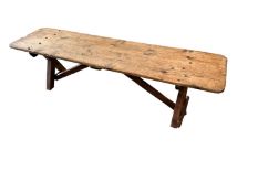 A rustic pine bench 168cm L x 47 H x 43cmW