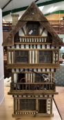 A vintage dolls house, fitted interior some furniture 90cm x 48cm