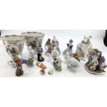 A mixed collection of ceramics, Meissen style figures, vases etc
