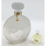 A shop display perfume Factice 'Nina' together with matching smaller example 29cm