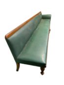 Victorian oak framed studded green rexine seat, possibly ex railway waiting room 410 cm Long, in