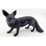 A resin model of a fox, 38cm x 25cm