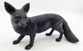 A resin model of a fox, 38cm x 25cm