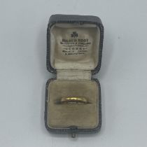 A 22ct gold wedding band, 1.95 size I
