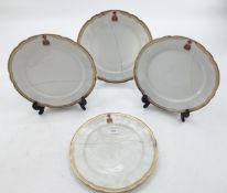 Four C19th French porcelain plates, gilt borders with crest, retailed by Cajoche Et Pannier A
