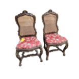 Pair of continental part gilded side chairs with bergere backs. No obvious losses or damage to