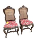 Pair of continental part gilded side chairs with bergere backs. No obvious losses or damage to