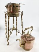A Victorian copper and brass kettle on stand with original heating box, pierced gallery on scrolling