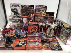 Collection of 1980/90s and later boxed examples of Hasbro Transformers to include Optimus Prime,