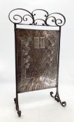 An Arts & Crafts secessionist style wrought iron and copper fire screens 86cmh