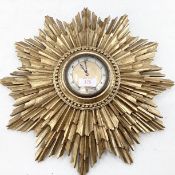 A giltwood sunburst wall clock with 8 day movement, 42cm