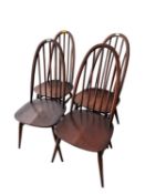 A dark wood ERCOL fall flap table 74cm wide, and spindle back chairs, and a settee