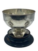 Sterling Silver circular bowl with raised floral decoration, on a turned wooden base, Elkington &