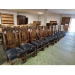 A good set of 12 high backed dining chairs, with blue upholstered seats 2 carvers + 10, Carvers 57