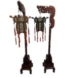 A pair of Chinese hardwood court dragon lanterns with hexagonal hand painted glass and hardwood