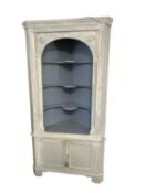 A painted vintage corner cupboard in the C18th style, 97cm W x 54cm D x 196cm H