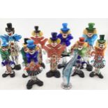A collection of eleven Murano style brown glass figures of clowns various sizes
